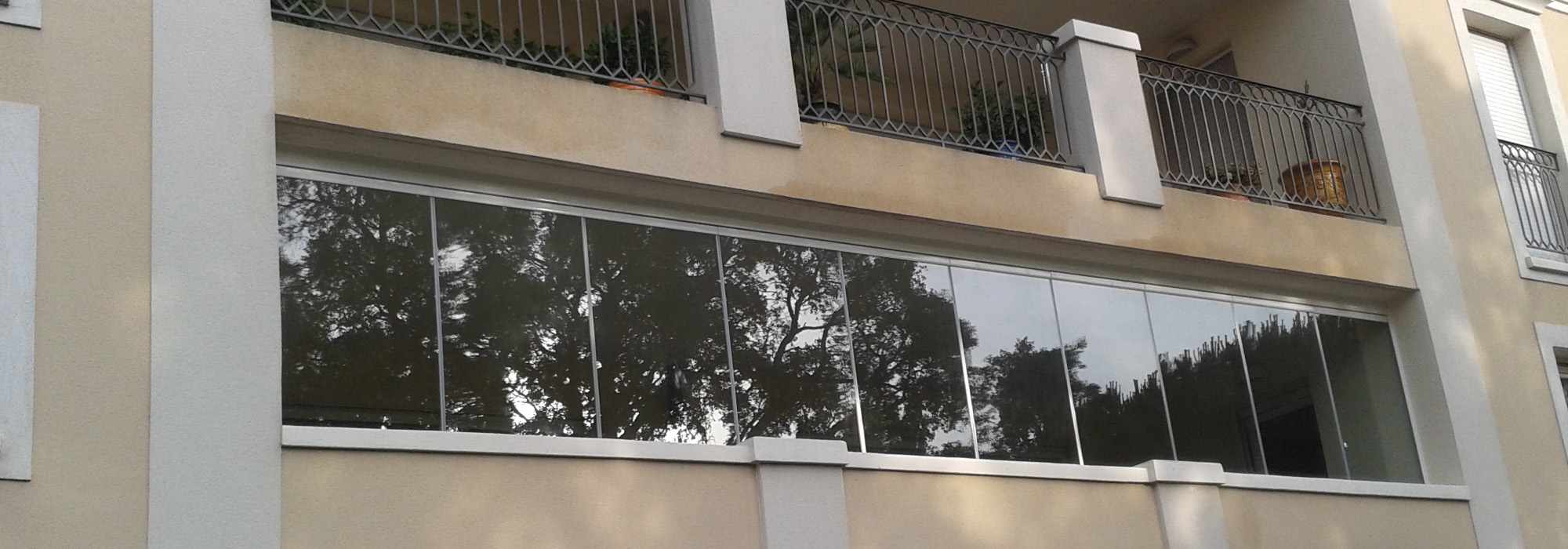 Aménagement et fermeture en verre pour balcons en copropriété