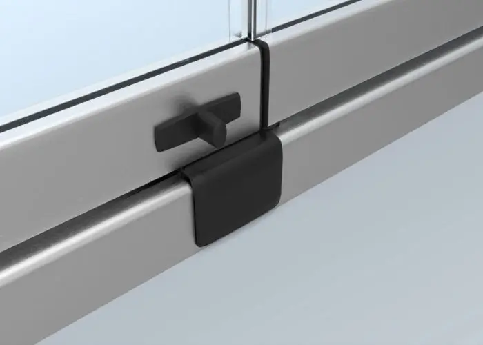 Solution de verrouillage bas de porte intérieur pour Rideau de Verre Glass Systems