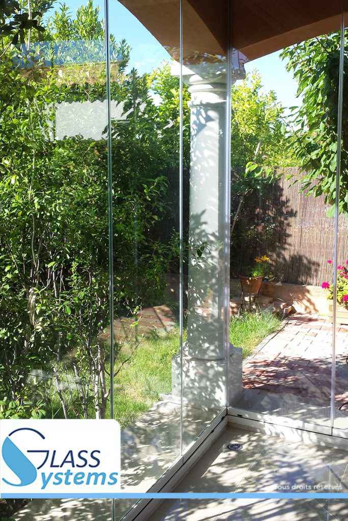 Rideau de verre pour fermer sa terrasse veranda