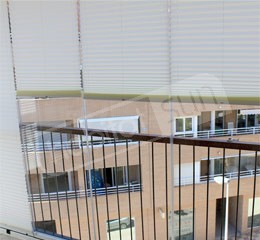 Protection contre le soleil pour fermeture en verre