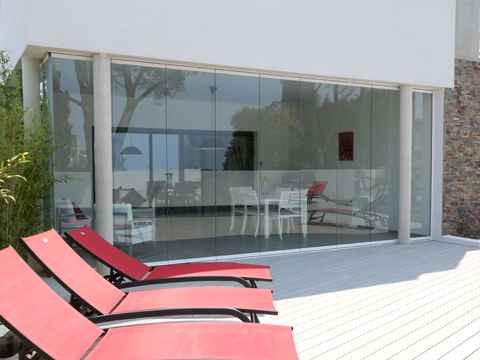 Fermer terrasse avec du verre